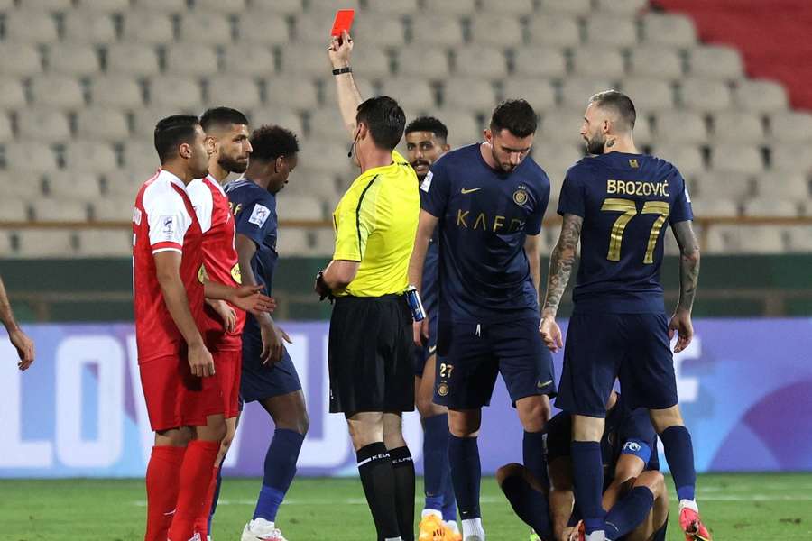 Milad Sarlak is given his marching orders during the AFC Champions League