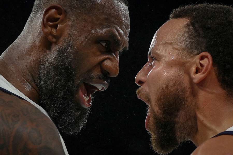 Lebron James of United States and Stephen Curry of United States celebrate at the Olympics