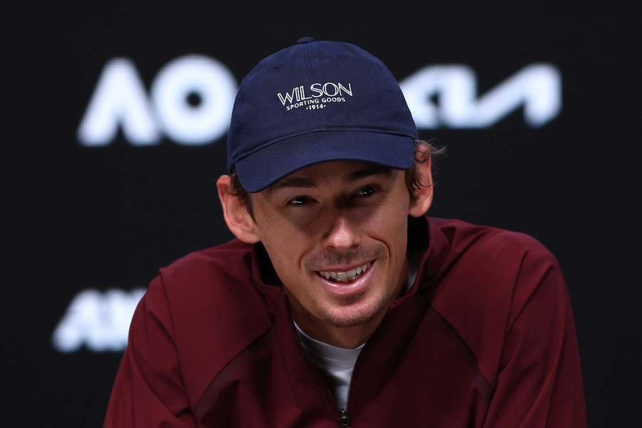 Alex De Minaur shares a laugh with reporters at Melbourne Park on Friday.