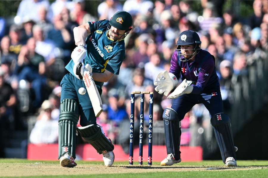 Australia's Travis Head (L) hit 80 off 25 balls in a rapid victory over Scotland