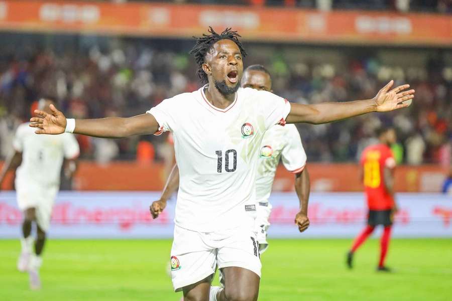 Austine Odhiambo celebrates after levelling the scores for Kenya against Angola