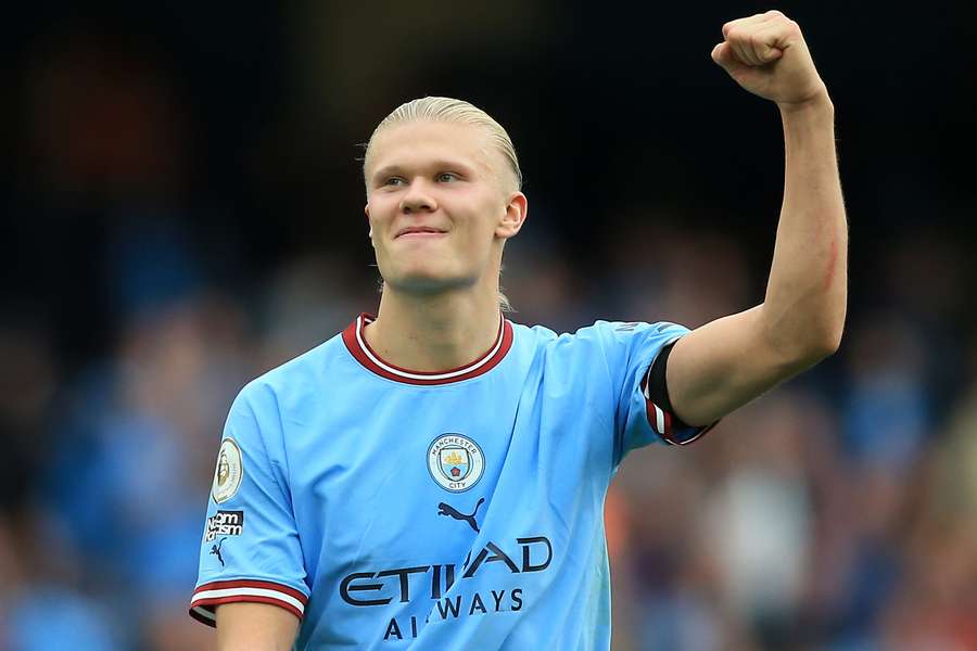 Erling Haaland gestures to fans after the English Premier League match between Manchester City and Manchester United 