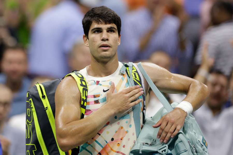 Carlos Alcaraz leaves the court after losing to Daniil Medvedev in the US Open semi-finals