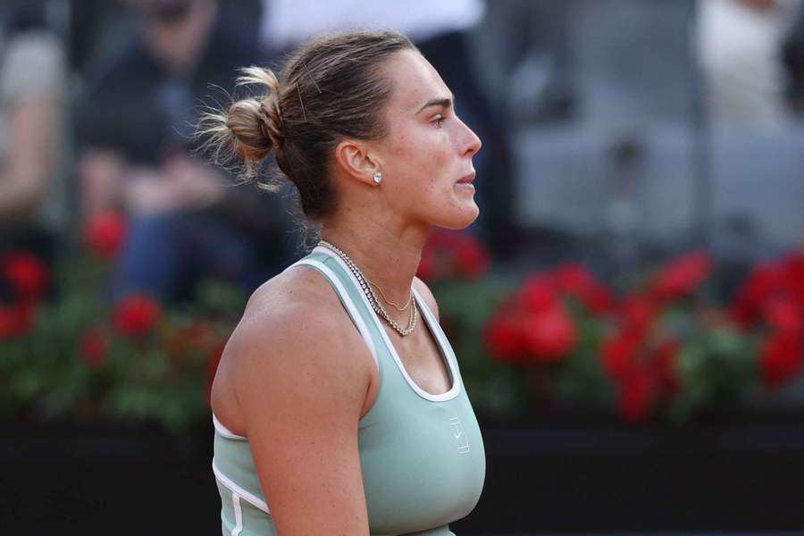 Belarus' Aryna Sabalenka reacts after her loss to Romania's Sorana Cirstea