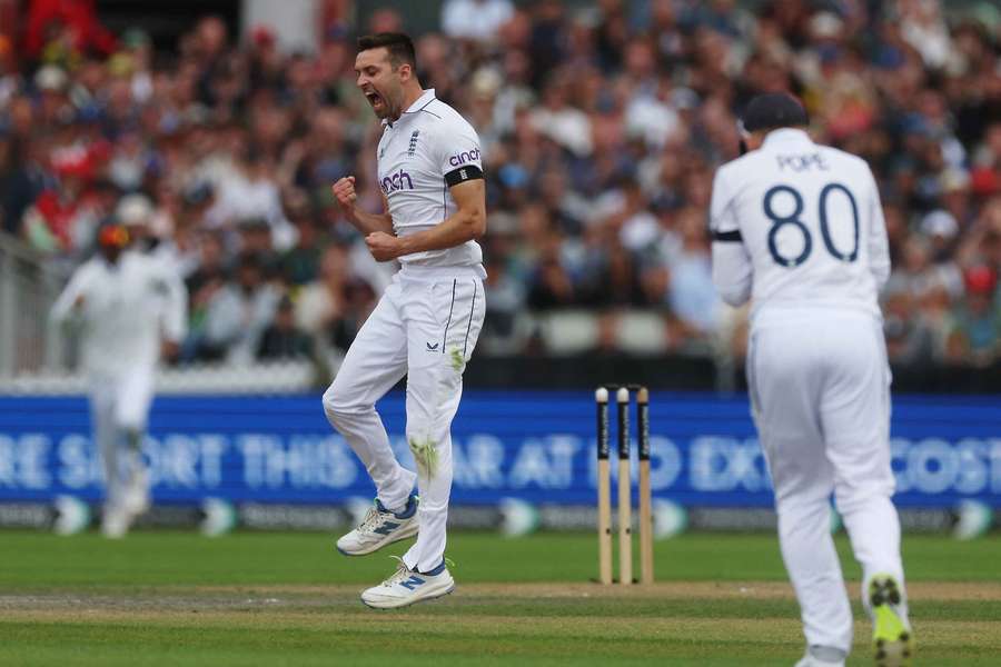 England's Mark Wood celebrates after taking the wicket of Sri Lanka's Kusal Mendis