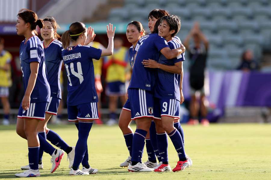 Japan’s Riko Ueki and teammates celebrate a Women's Asian Cup goal against Vietnam. Japan’s Riko Ueki and teammates celebrate a Women's Asian Cup goal against Vietnam.