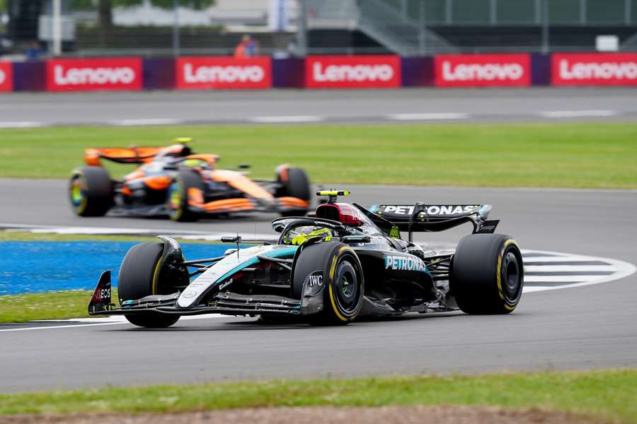 Hamilton in his Mercedes ahead of McLaren's Norris