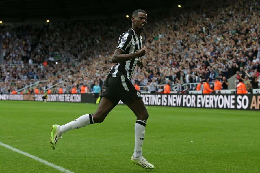 Newcastle United's Swedish striker #14 Alexander Isak celebrates after scoring their third goal 