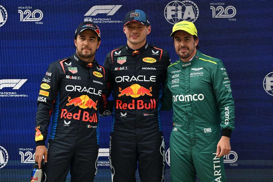 Max Verstappen (C) takes pole in China, alongside Sergio Perez (L) and Fernando Alonso (R)
