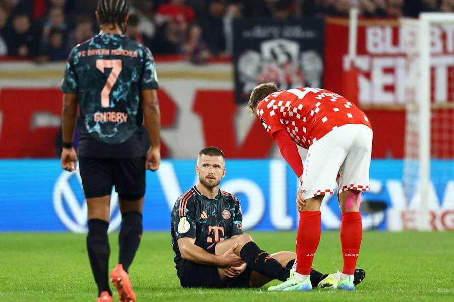 Bayern Munich's Eric Dier goes down after sustaining an injury