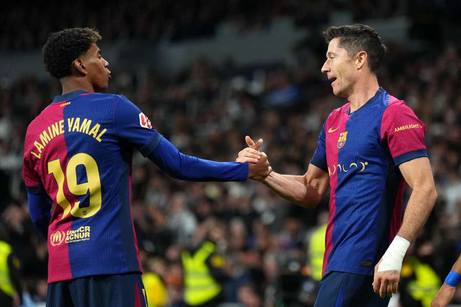 Robert Lewandowski, right, and Lamine Yamal scored three of the four goals for Barcelona