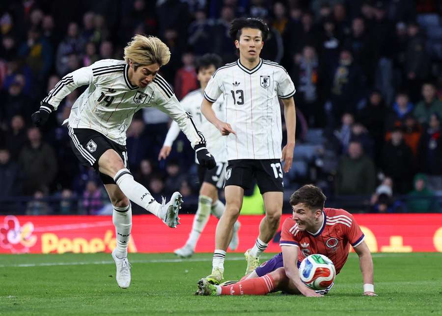 Japan's Junya Ito scores the first goal Japan's Junya Ito scores the first goal