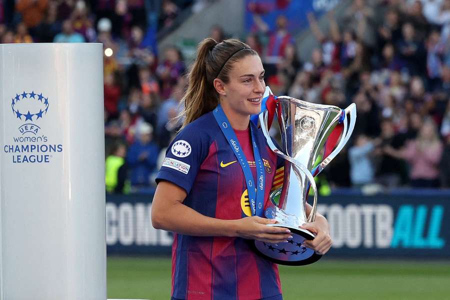 Putellas poses with the UEFA Women's Champions League trophy