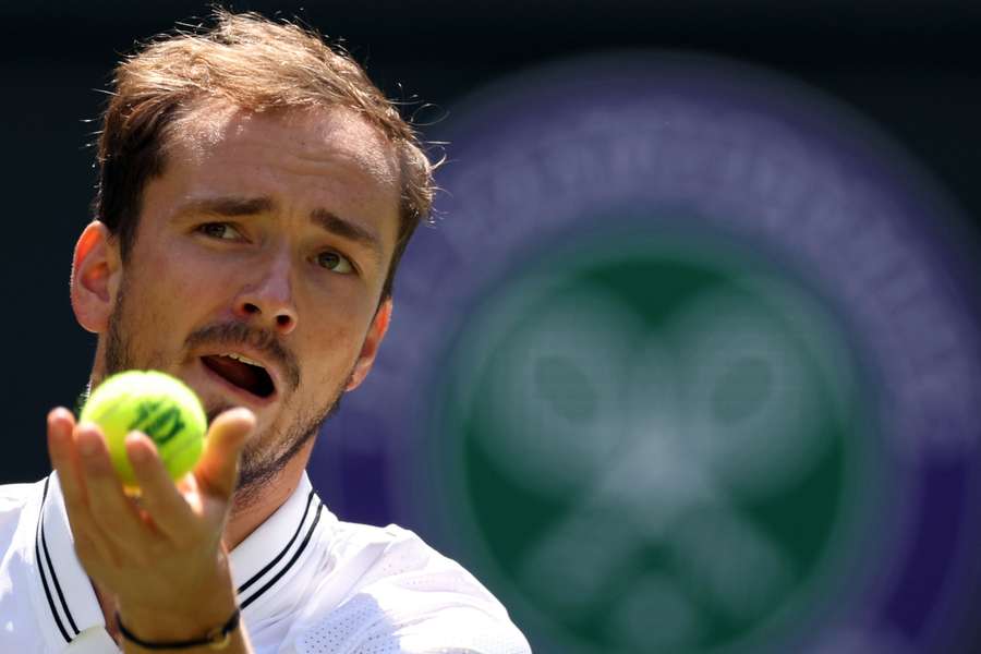 Russia's Daniil Medvedev holds the ball prior to serving to Britain's Arthur Fery