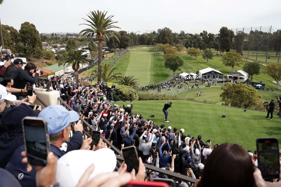 Tiger Woods tees off during the first round of the The Genesis Invitational at Riviera Country Club