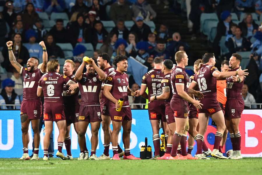 Queensland players celebrate their game three Origin win last year. Queensland players celebrate their game three Origin win last year.
