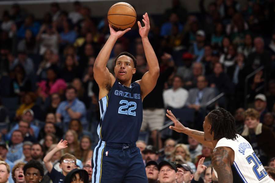 Grizzlies guard Desmond Bane shoots for three during the second half against the Magic 