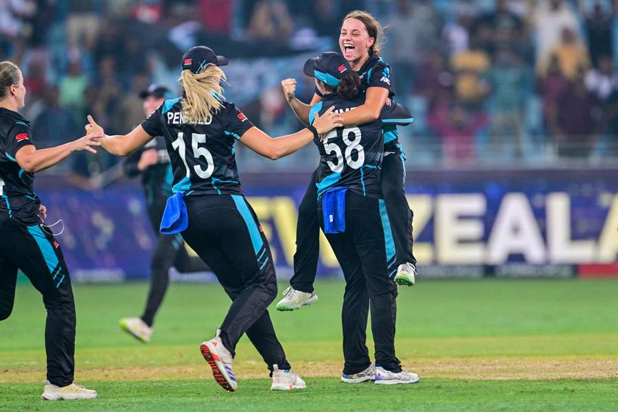 New Zealand's players celebrate their victory at the Women's T20 World Cup cricket final