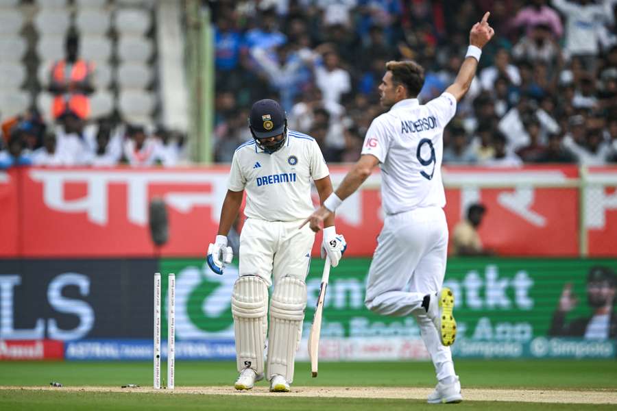 England's James Anderson celebrates after taking the wicket of India's captain Rohit Sharma