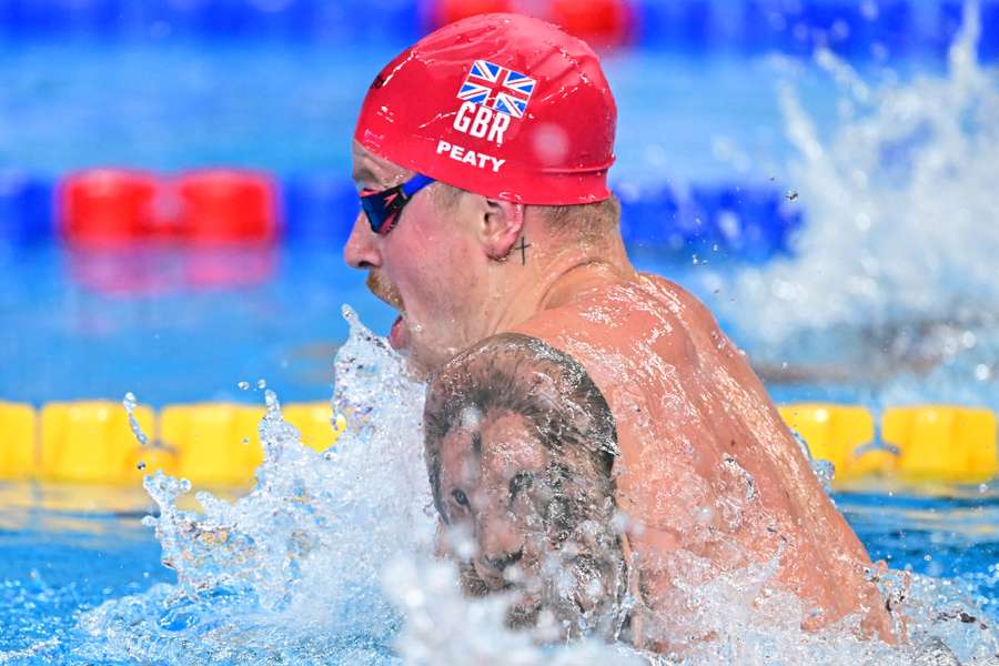 Britain's Adam Peaty competes in the final of the men's 100m breaststroke