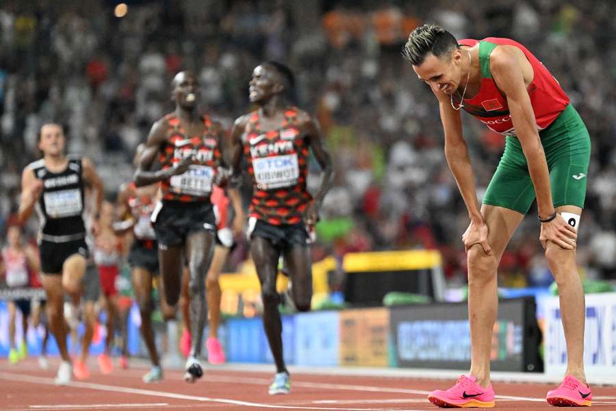 Soufiane El Bakkali takes a breather after winning gold in the 5,000m steeplechase