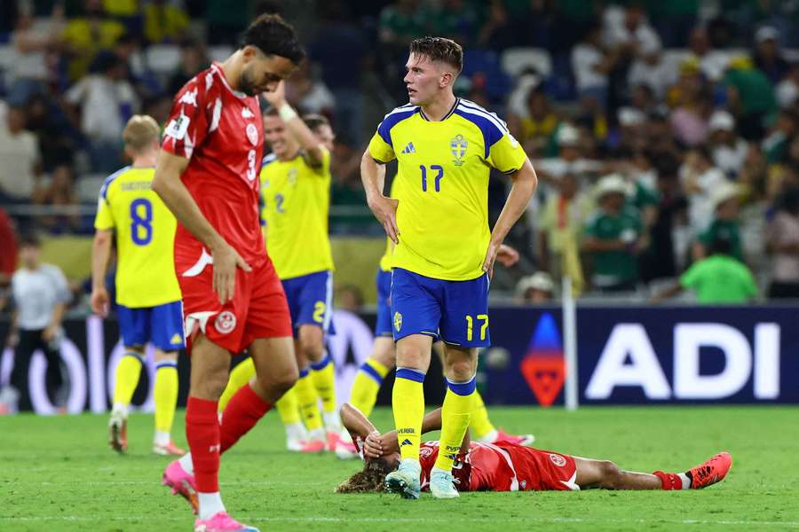 Tunisia's players were dejected after the match Tunisia's players were dejected after the match