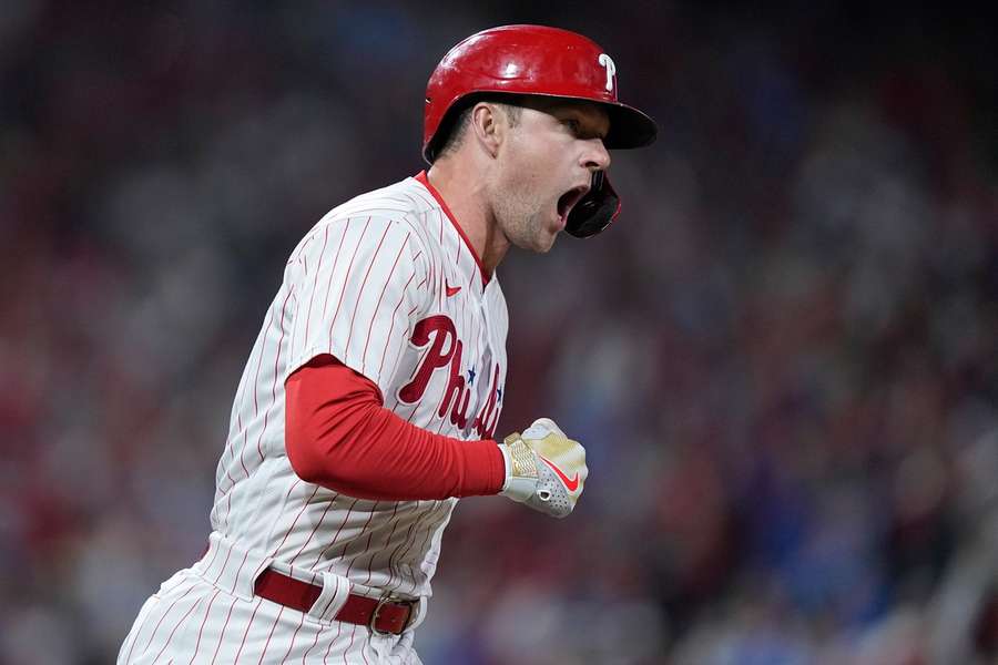 Rhys Hoskins hit two home runs as his Philidelphia side beat San Diego 10-6 to edge closer to the World Series