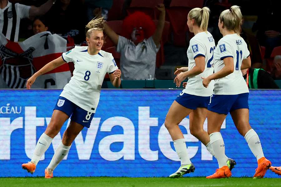 Georgia Stanway celebrates with teammates after scoring the opening goal