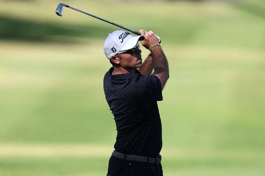Julien Guerrier of France plays his second shot on the 18th hole on Day Two of the Nedbank Golf Challenge