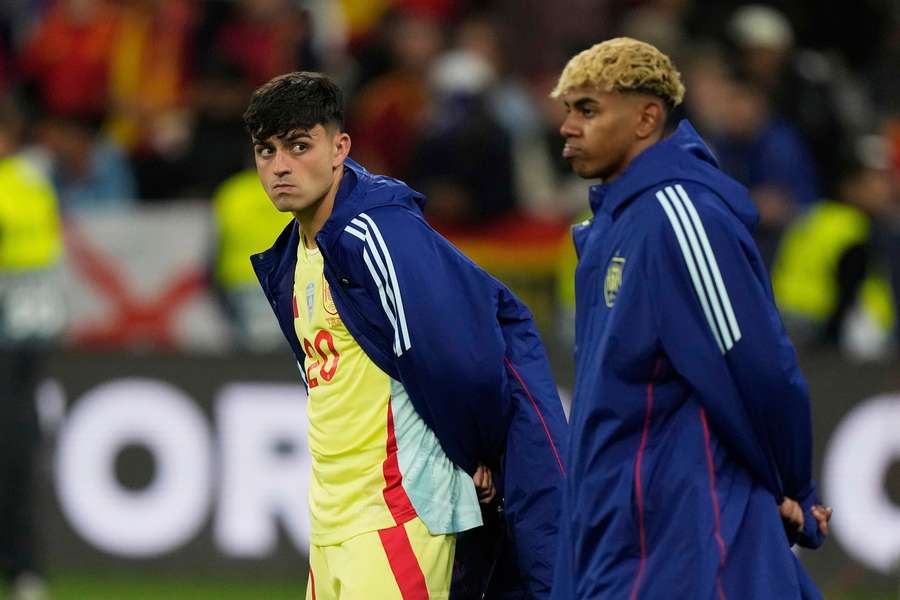 Pedri, left, and Spain's Lamine Yamal stand on the pitch after the Nations League final Pedri, left, and Spain's Lamine Yamal stand on the pitch after the Nations League final