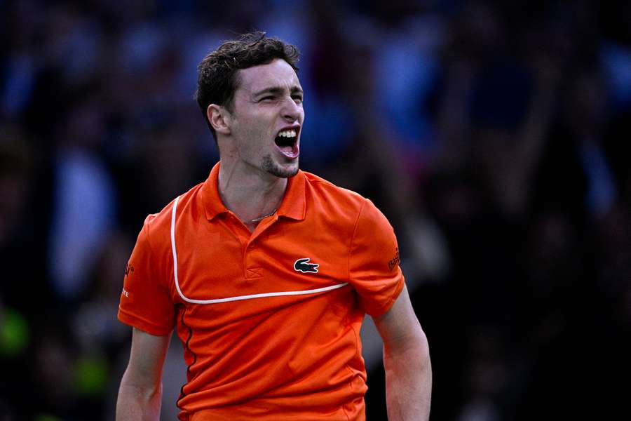 Ugo Humbert celebrates after beating Carlos Alcaraz