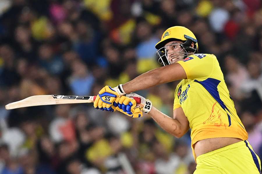 Chennai Super Kings' Shivam Dube watches the ball after playing a shot