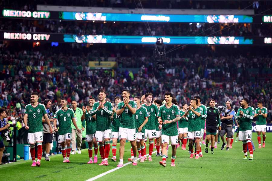 Raul Jimenez celebrates with teammates after the match as Mexico qualify for the round of 16 stage of the World Cup Raul Jimenez celebrates with teammates after the match as Mexico qualify for the round of 16 stage of the World Cup