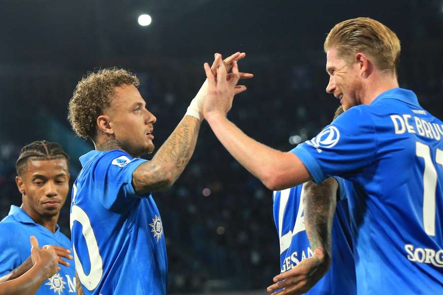 Lang (L) and De Bruyne celebrate together Lang (L) and De Bruyne celebrate together