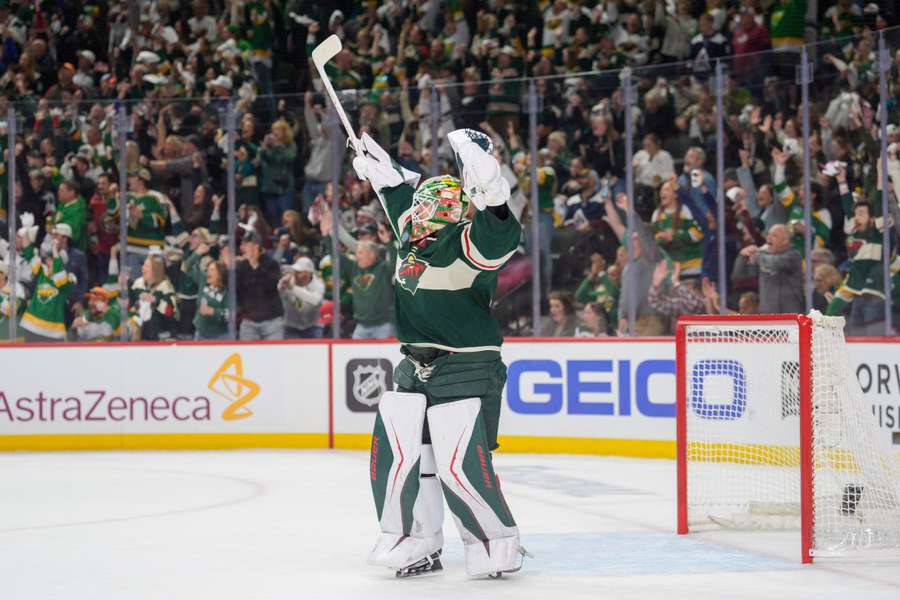 Wild Jesper Wallstedt celebrates goal in game 3 against Colorado Avalanche