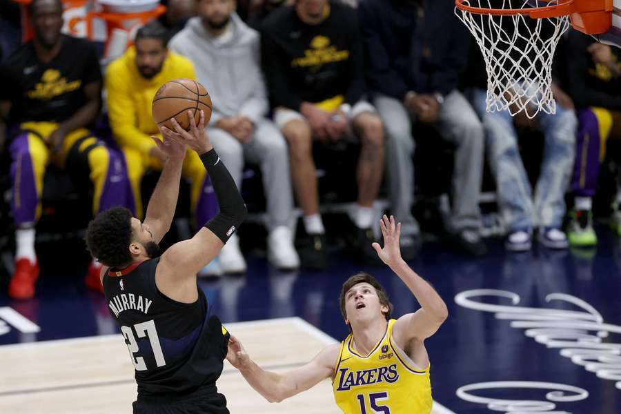 Denver's Jamal Murray puts up a last-second shot against Anthony Davis in the Nuggets' victory over the Los Angeles Lakers