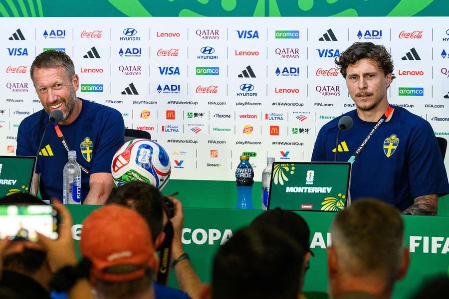 Graham Potter (L) and Victor Lindelof at the pre-match press conference
