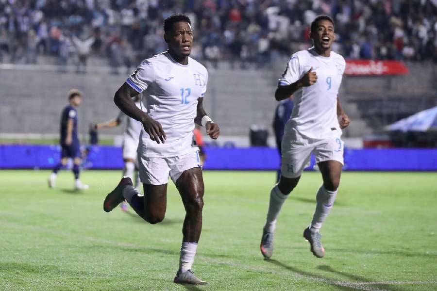 Romell Quioto (L) of Honduras celebrates scoring
