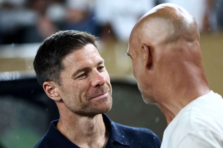 Real Madrid coach Xabi Alonso with RB Salzburg coach Thomas Letsch before the match