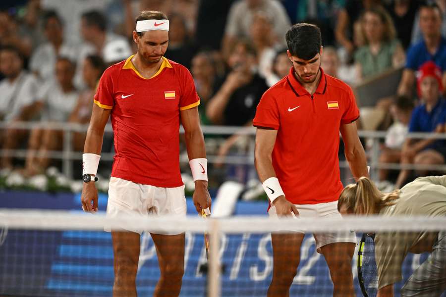 Nadal (L) and Alcaraz in action at the 2024 Olympics