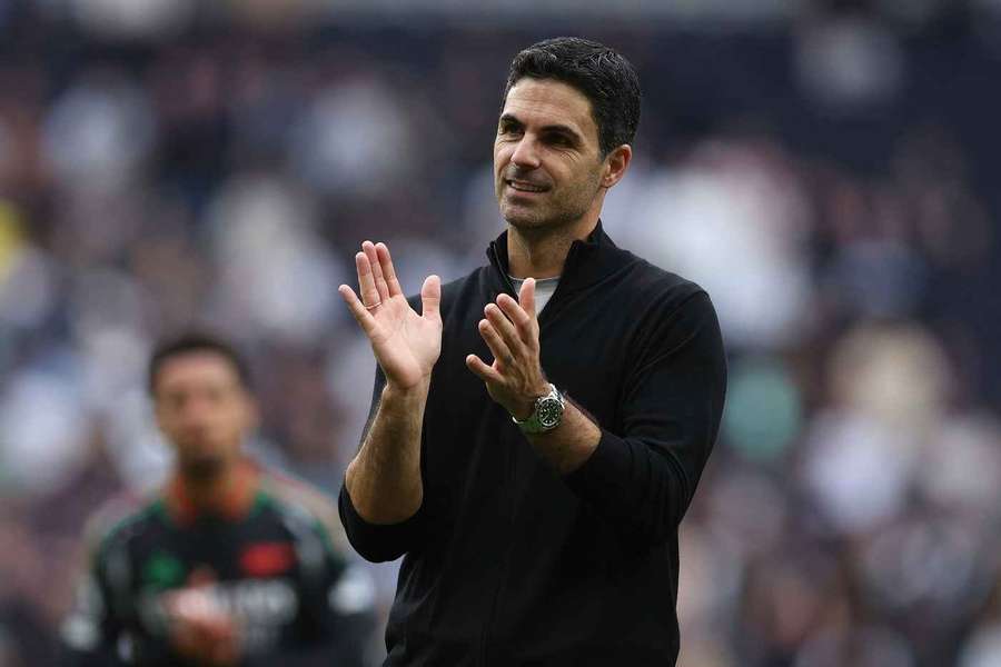 Arsenal manager Mikel Arteta applauds the fans