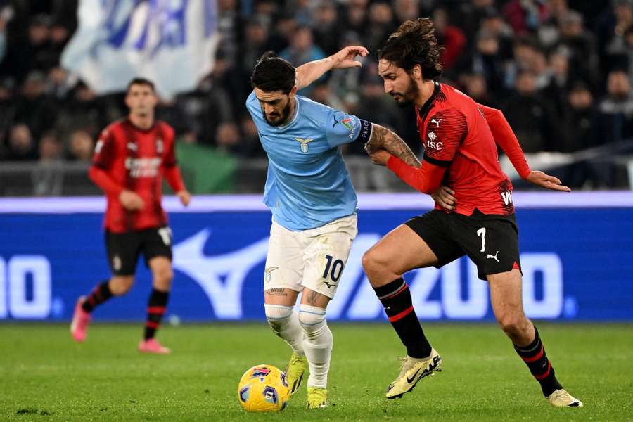 Lazio's Luis Alberto fights for the ball with AC Milan's Yacine Adli