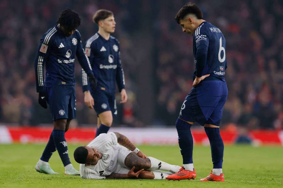 Gabriel Jesus reacts after sustaining an injury against Manchester United in the FA Cup