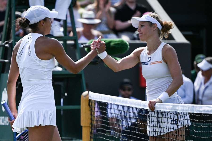 Laura Siegemund (right) shakes hands with Madison Keys