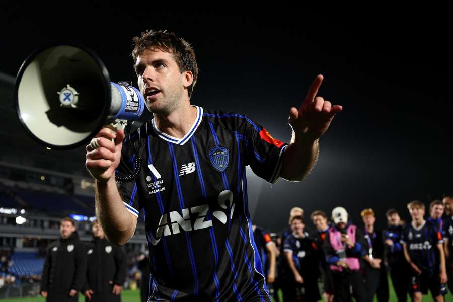 Guillermo May leads the post-game chants after Auckland FC eliminate Melbourne City from last season's A-League finals.