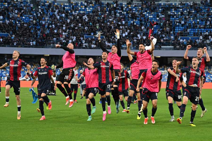 Bologna players celebrate after beating Napoli at the weekend