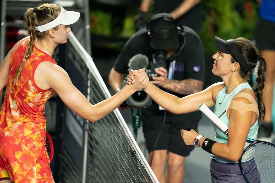 Jessica Pegula shakes hands with Elena Rybakina after their match
