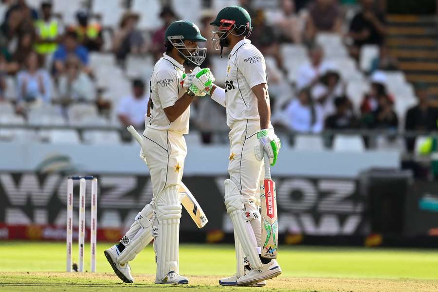 Shan Masood and Babar Azam shake hands during their partnership