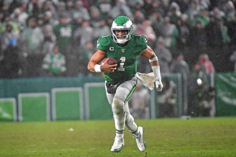 Philadelphia Eagles quarterback Jalen Hurts runs with the ball during overtime win against the Buffalo Bills 