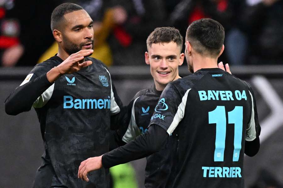Leverkusen players celebrate goal